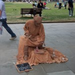 A mime in the park along the River Thames