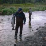 Jason holds up his salmon