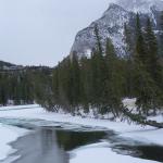 A frozen river runs through Banff