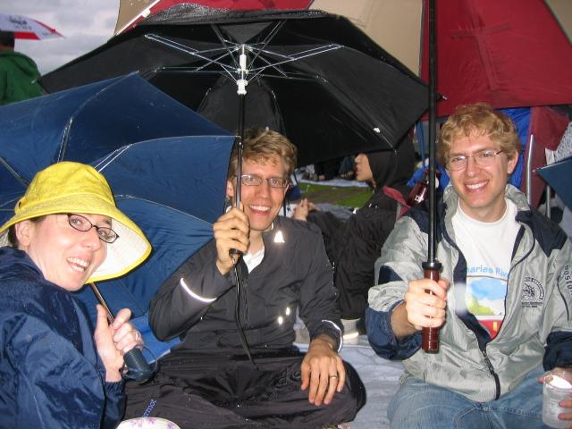 Rachel, Tim, and Jason staying dry