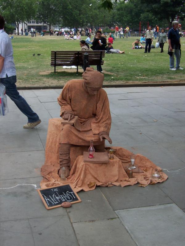 A mime in the park along the River Thames