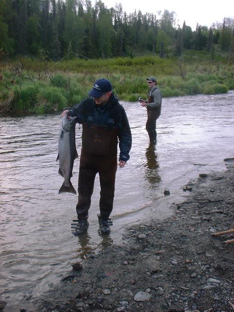 Jason holds up his salmon