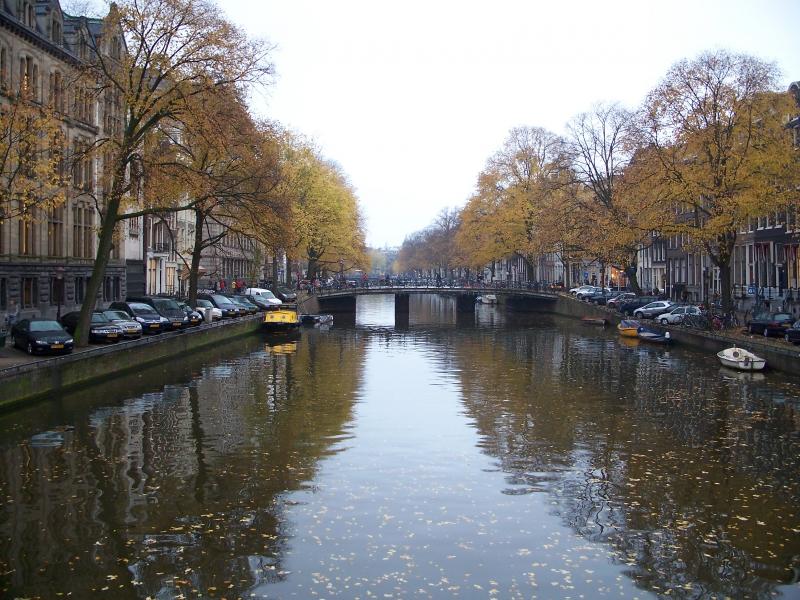 View down a wide Amsterdam canal