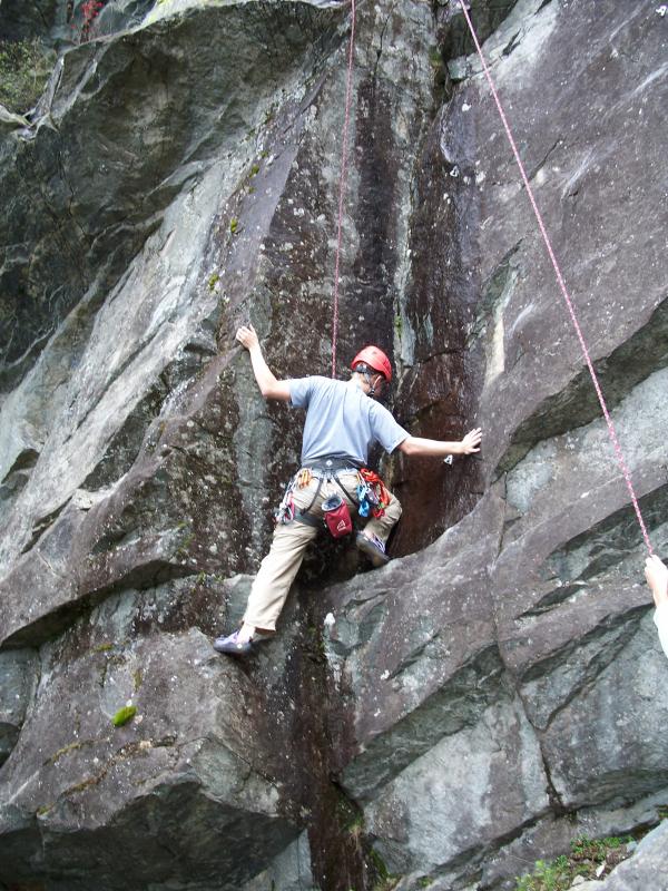 Jason climbing through a wet patch
