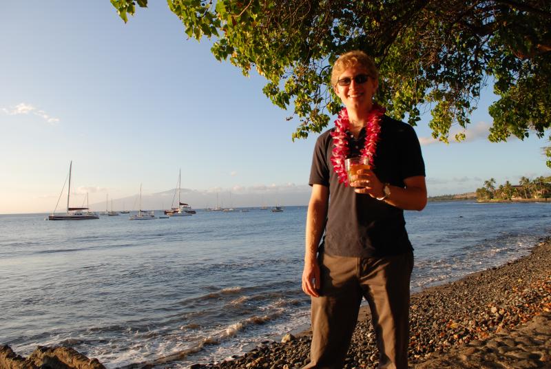 Jason enjoys his mai tai along the shore