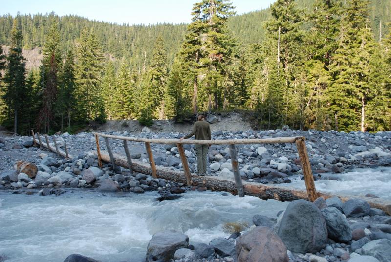 Katie crossing the river