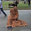 A mime in the park along the River Thames