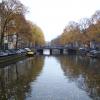 View down a wide Amsterdam canal