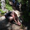 Stacia sneaks up on a plant with her iPhone