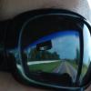 The highway, reflected in Katie&#039;s sunglasses
