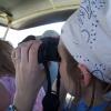 Katie works the binoculars