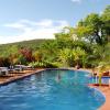 Katie enjoying the pool at Plantation Lodge